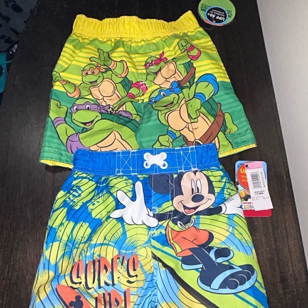 Set of 2 NWT swimming trunks size 12 months